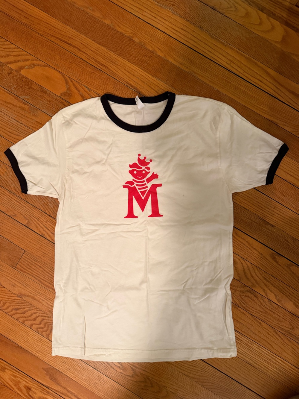Adorable Women’s White Ringer Tee with Red Crest Graphic